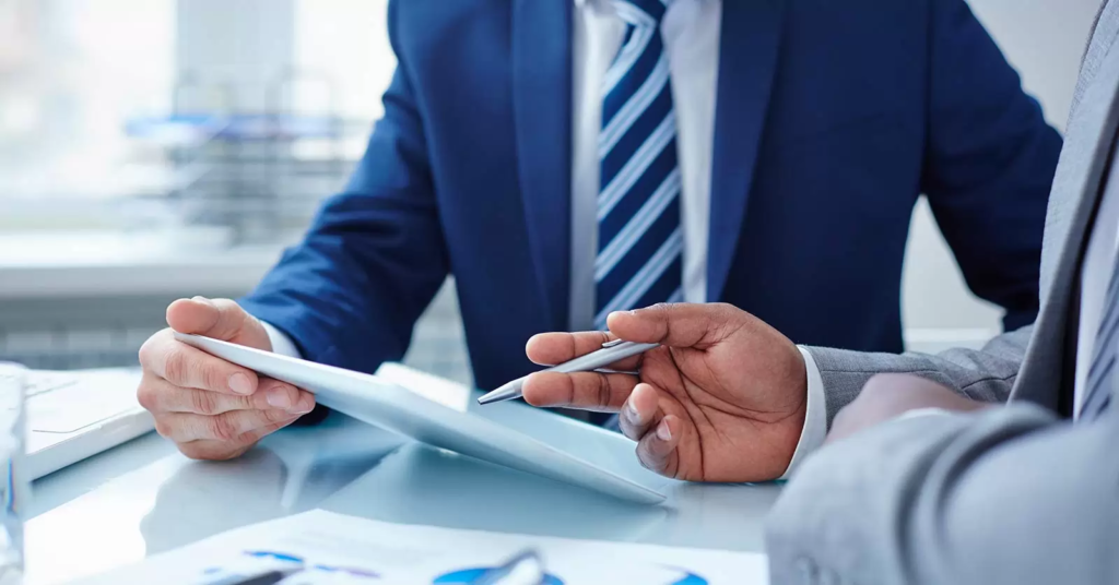 A business professional reviewing necessary documents for trade license application.